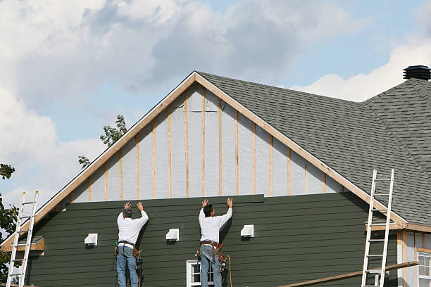 Professional Siding Replacement technician working in Hague, VA